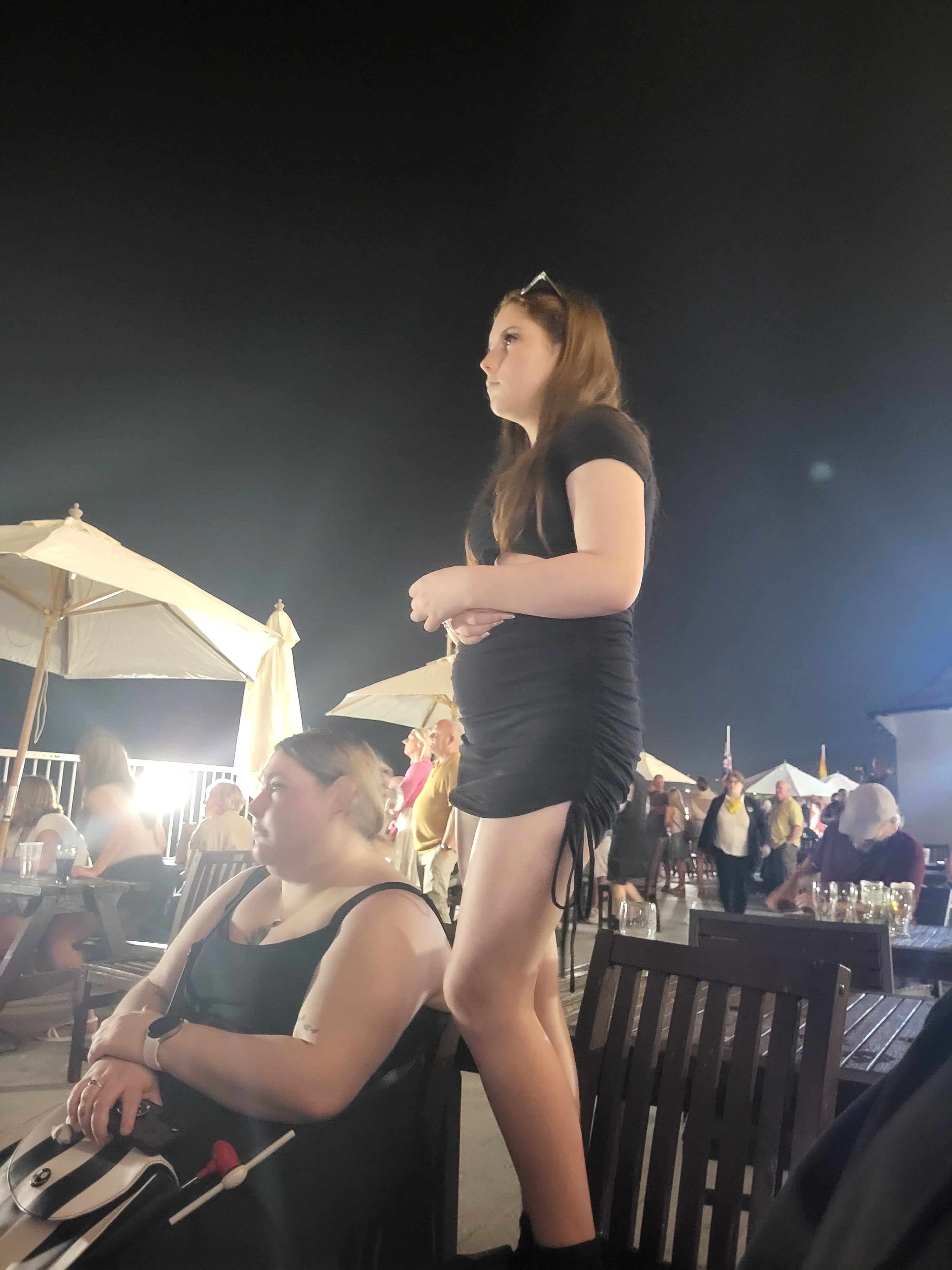 lexii stood on a chair watching the fireworks