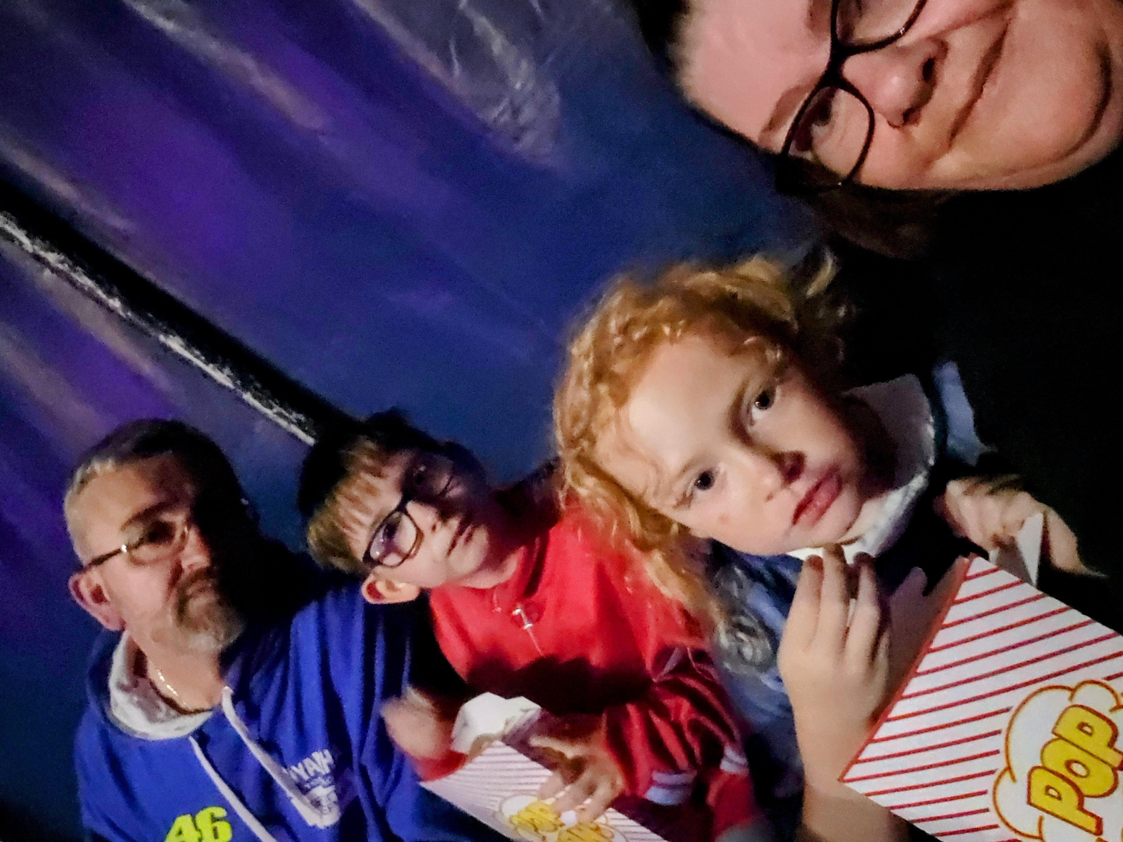grandad jay warren and pandora eating popcorn at the circus