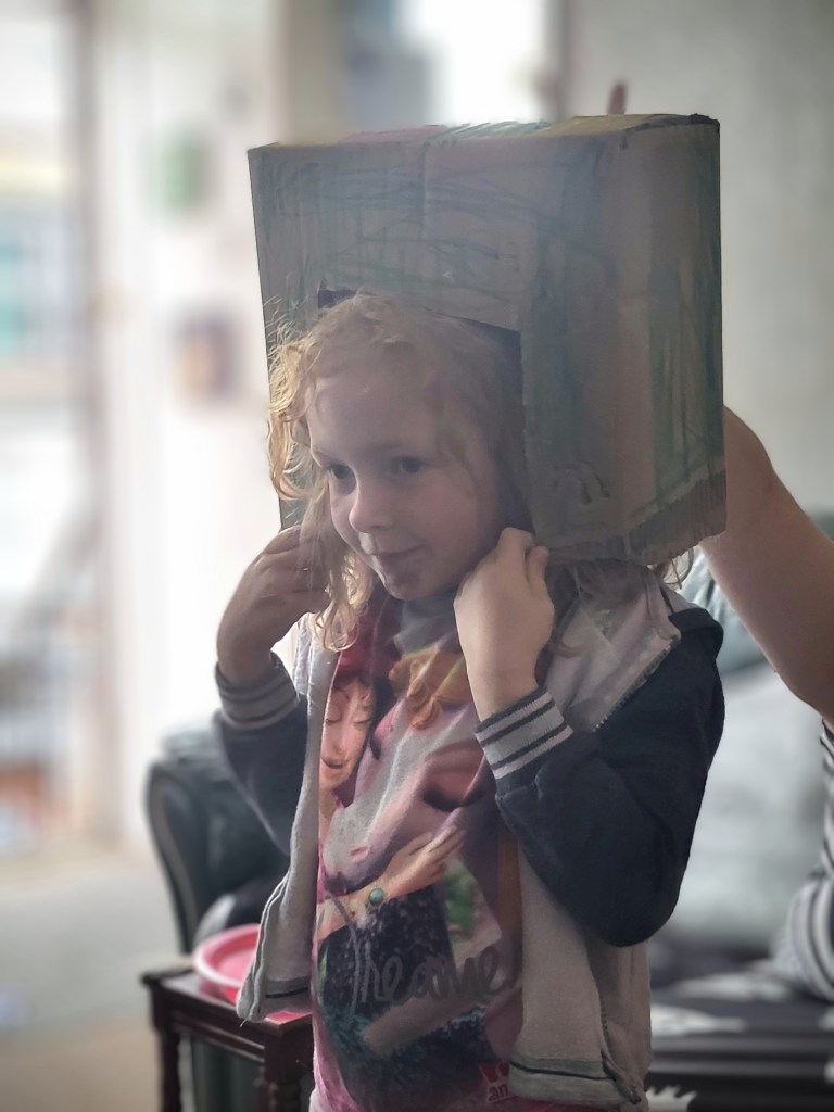 pandora with her robot box head on